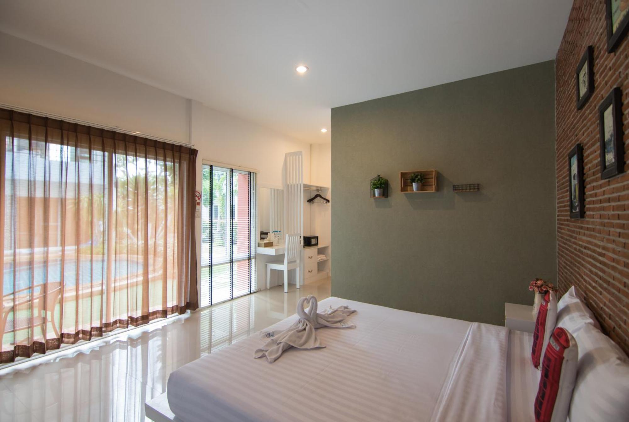 Milano Huahin Hotell Rum bild